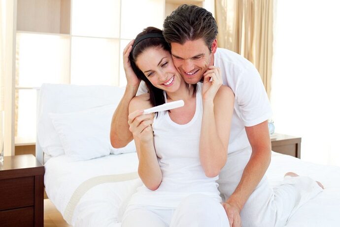 enamored-couple-finding-out-results-of-a-pregnancy-test